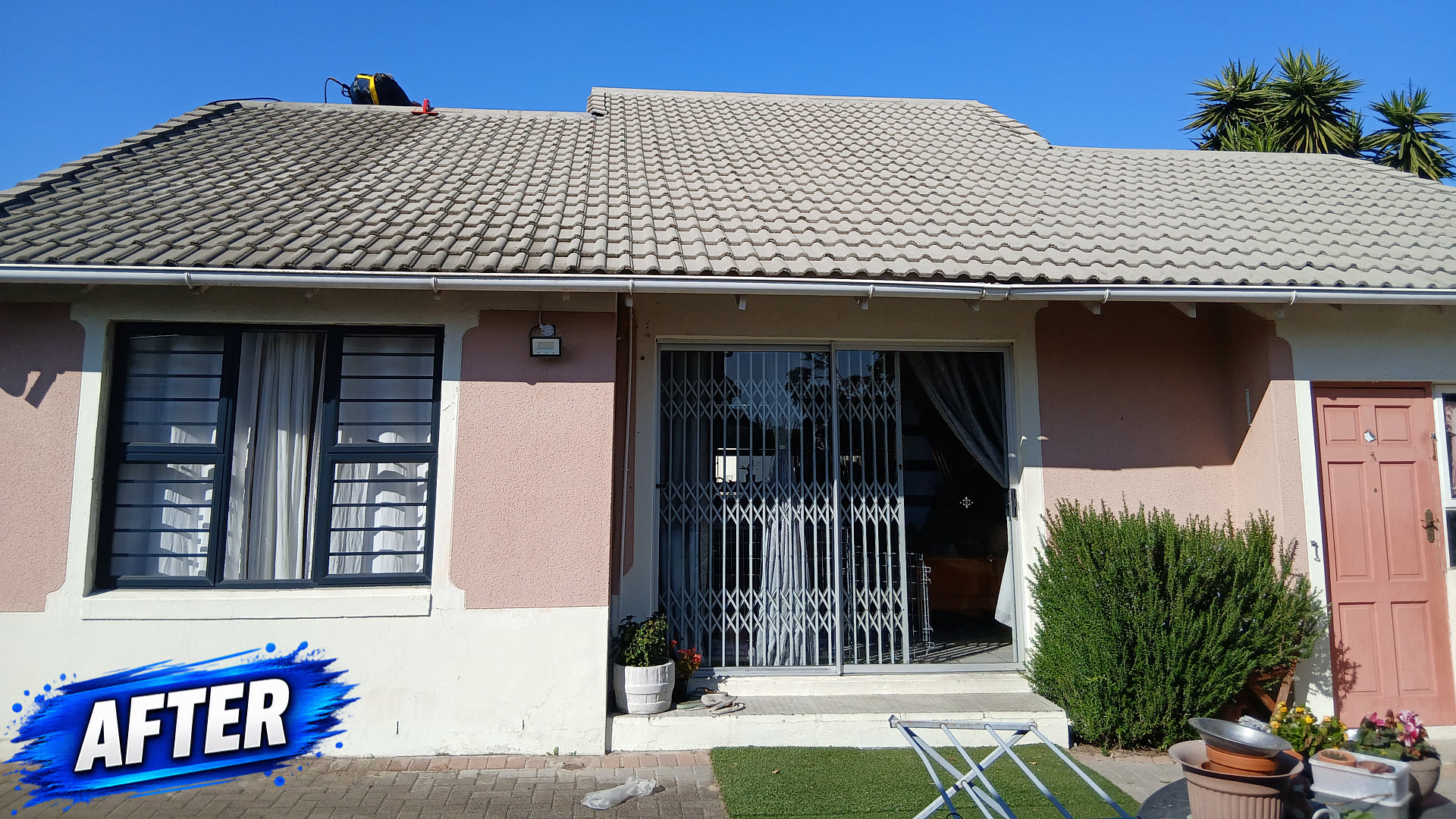 Roof after pressure washing — clean tiles restored